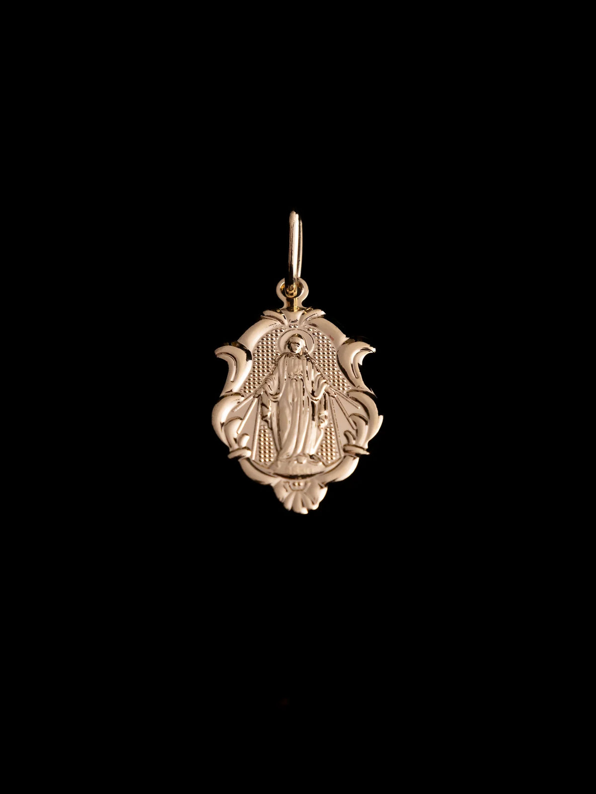Dije Milagrosa Tallada Light en Oro laminado 18k